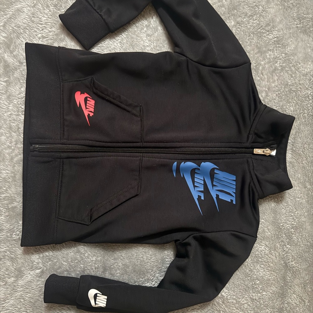 Kids Nike Black Jacket with Vibrant Logos